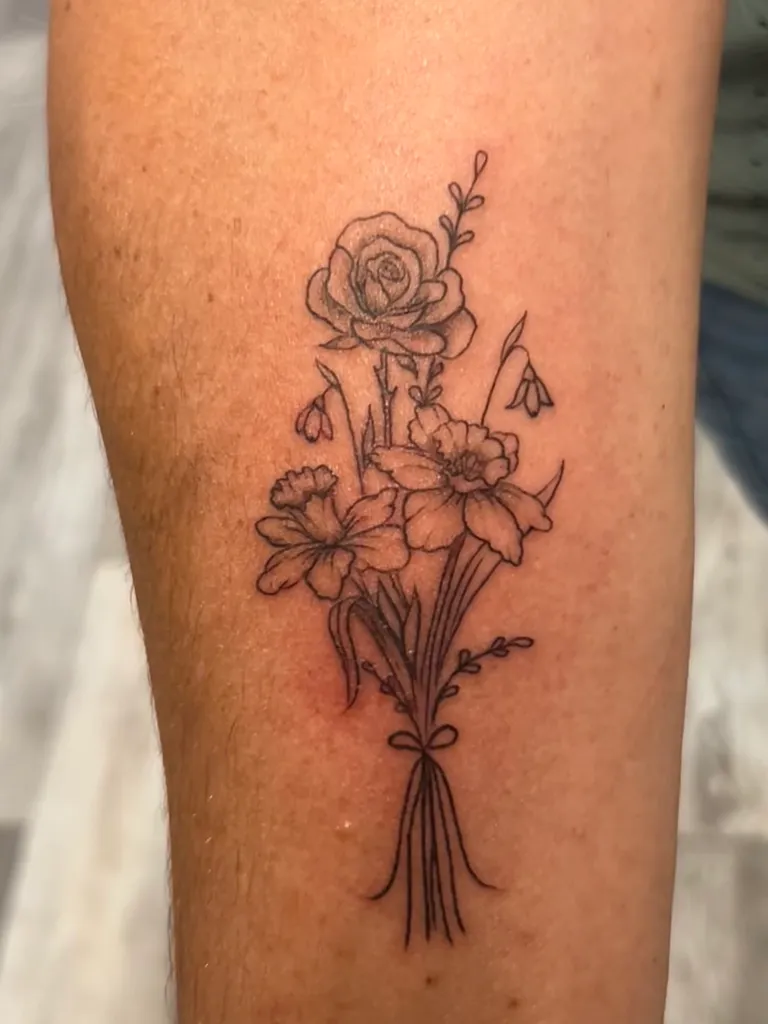 Floral tattoo by Katelyn Alvarado at Golden Child Tattoo in Escondido