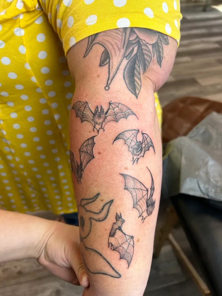 Illustrative tattoo by Katelyn Alvarado at Golden Child Tattoo in Escondido