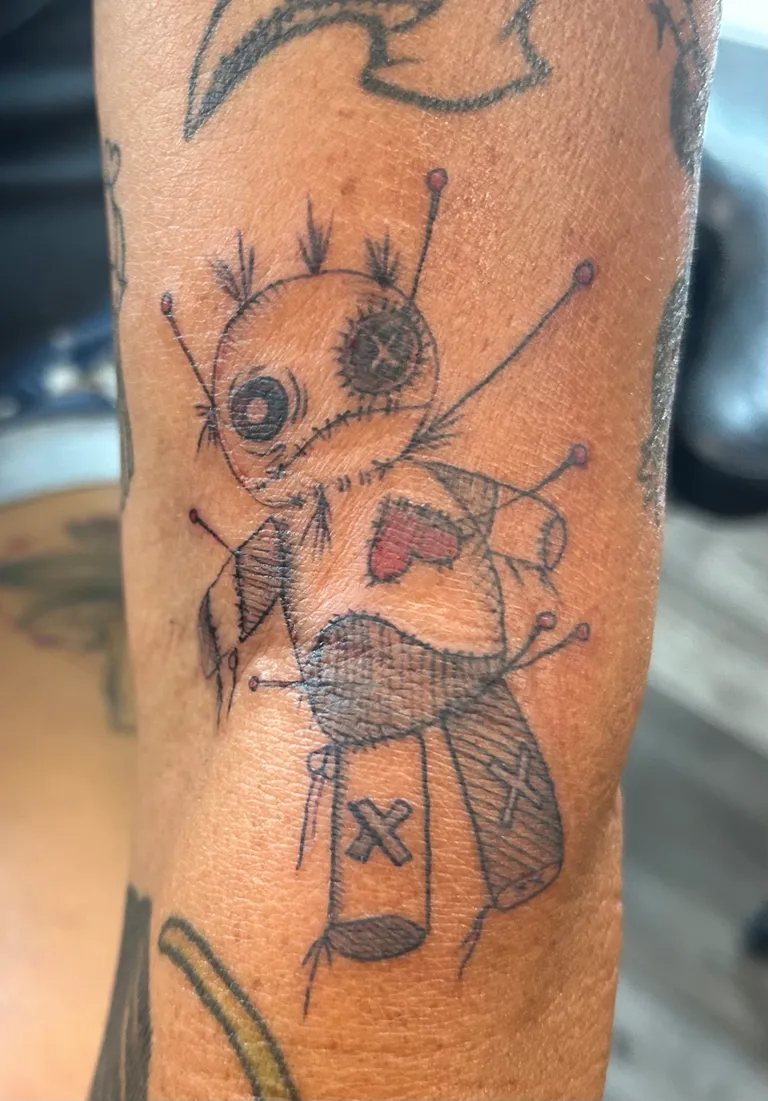 Illustrative tattoo by Katelyn Alvarado at Golden Child Tattoo in Escondido