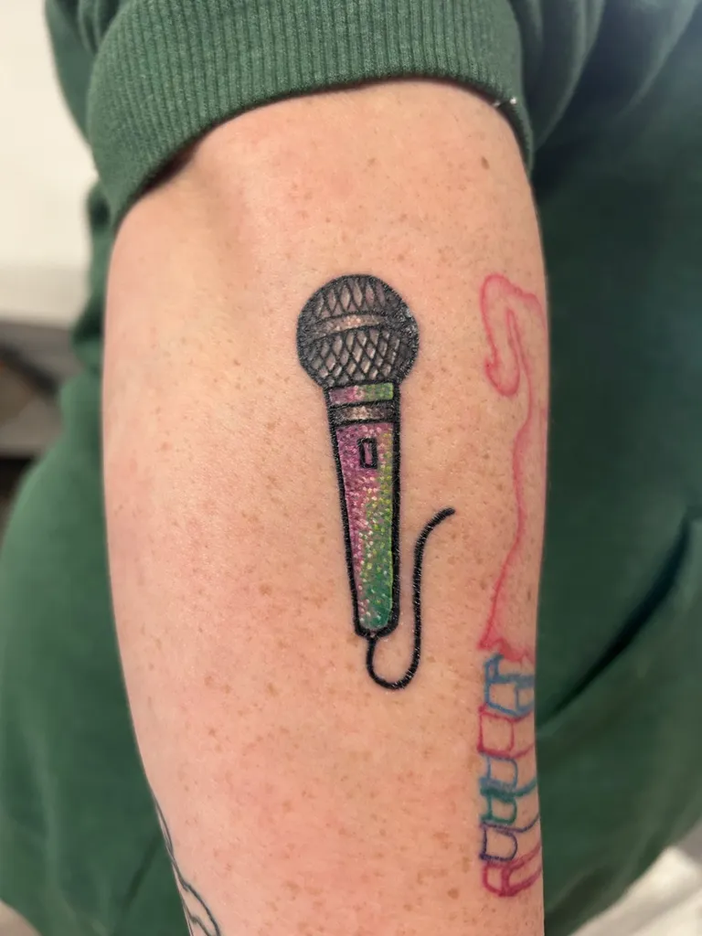 Illustrative tattoo by Katelyn Alvarado at Golden Child Tattoo in Escondido