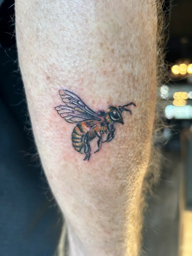 Illustrative tattoo by Katelyn Alvarado at Golden Child Tattoo in Escondido