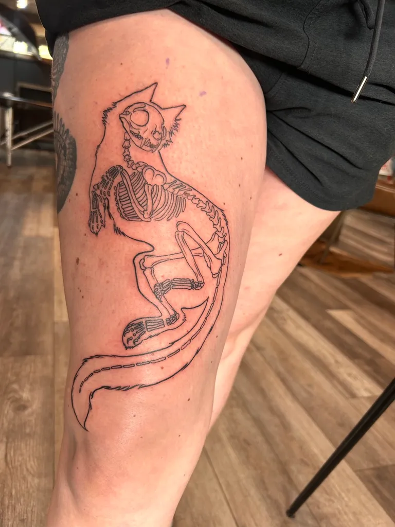 Illustrative tattoo by Katelyn Alvarado at Golden Child Tattoo in Escondido