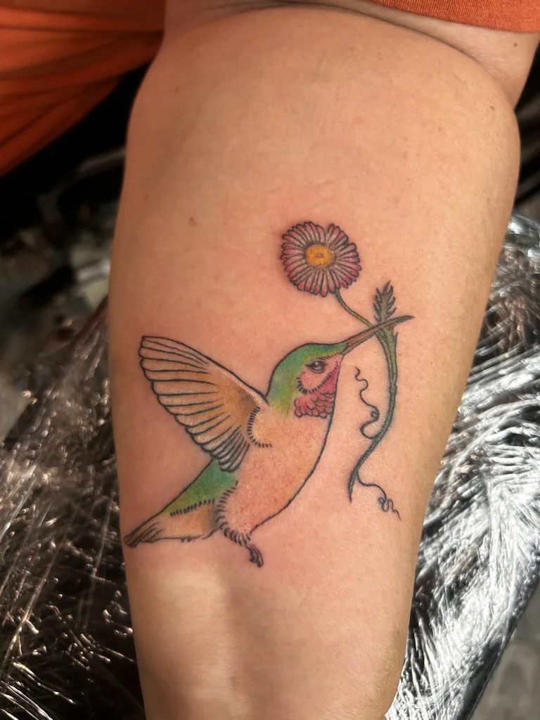 Illustrative tattoo by Katelyn Alvarado at Golden Child Tattoo in Escondido
