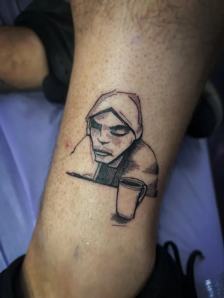 Hooded figure tattoo based on an album cover, on the arm by Melissa at Golden Child Tattoo in Escondido