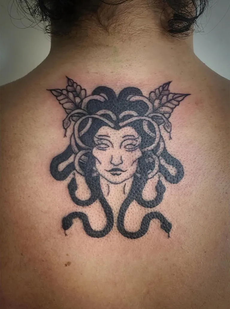 Medusa tattoo on the upper back by Melissa at Golden Child Tattoo in Escondido