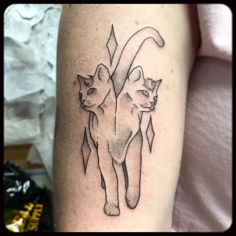 Illustrative tattoo by Nick Crawford at Golden Child Tattoo in Escondido