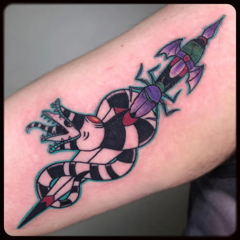 Illustrative tattoo by Nick Crawford at Golden Child Tattoo in Escondido