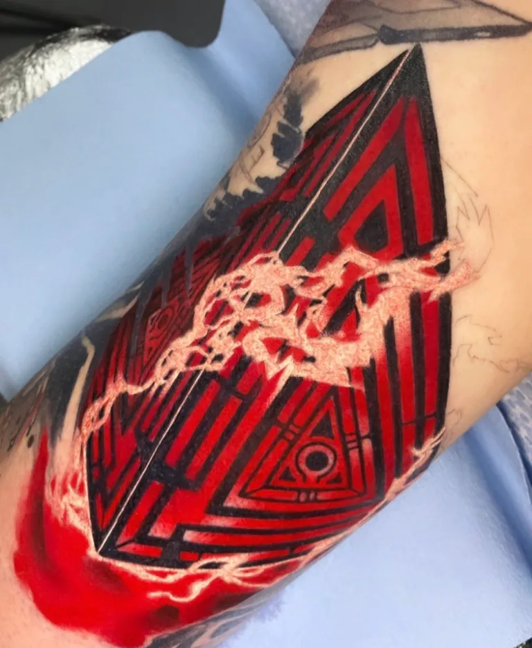 Abstract geometric symbol tattoo