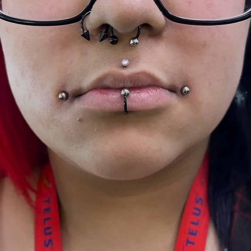 Dahlia piercing by Wheels at Golden Child Tattoo in Escondido