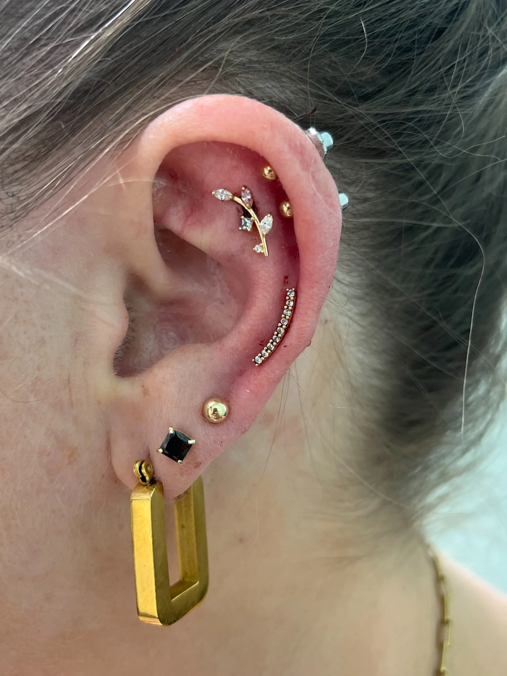 Flat piercing by Wheels at Golden Child Tattoo in Escondido